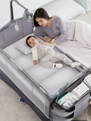 Crib next to bassinet, nappy changer and playpen for babies from birth to adulthood.