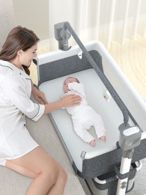Portable and Foldable Electric Baby Bed Cribs for Easy Travel