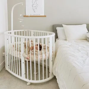 The Ultimate 7-in-1 Oval Convertible Cot Bed - White