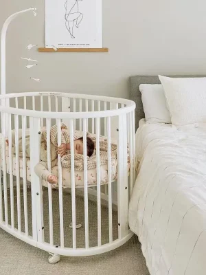 The Ultimate 7-in-1 Oval Convertible Cot Bed - White